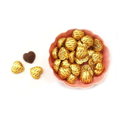 Máquina de embalaje de papel en forma de corazón para el chocolate