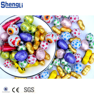 Máquina de envoltura de huevos de chocolate Joy sorpresa totalmente automática para el embalaje simplificado