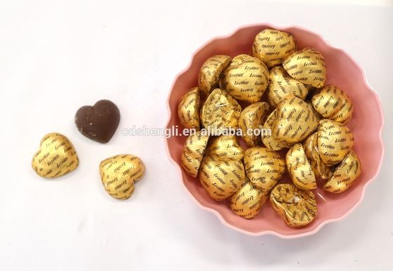 Máquina de embalaje de galletas de papel de aluminio para caramelos Función principal Embalaje de chocolate