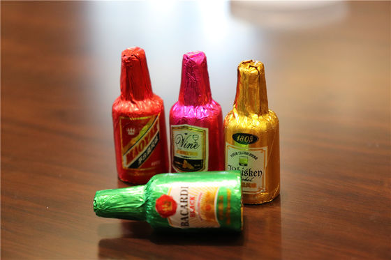 Material de embalaje de papel Botella de cera de mini botella de chocolate Máquina de embalaje multifunción