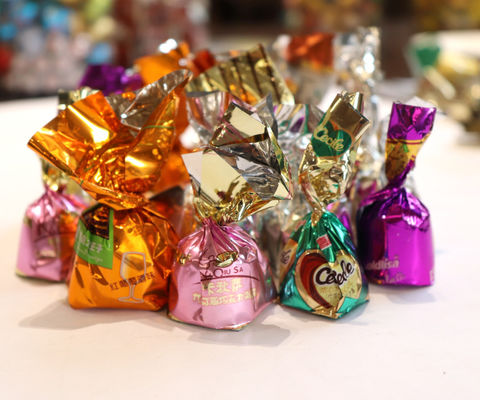 Máquina de embalaje con llave horizontal de plata de chocolate personalizada para embalaje de dulces